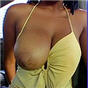 Fotos de Negra tetona en follada interracial gratis